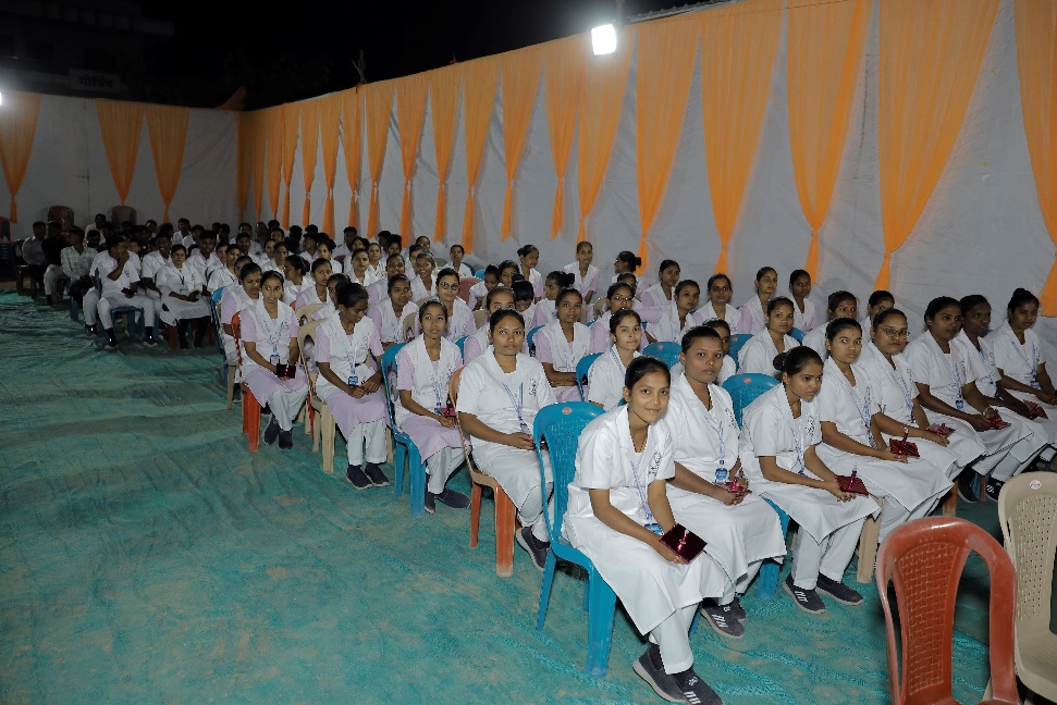 Nursing staff and students at a hospital ceremony